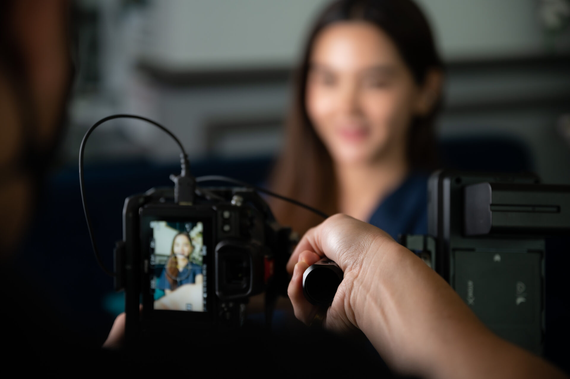 Young Asian woman person are live video streaming broadcast technology at home